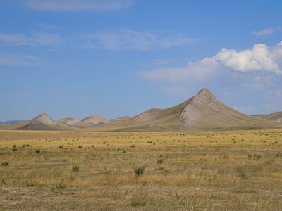 kazakhstan, grass landscape, hill, arid landscape, geology, natural space, open landscape, steppe, earth formation, expanse, ecology, nature, horizon, mountains, rock, dry vegetation, landscape, quiet, wilderness