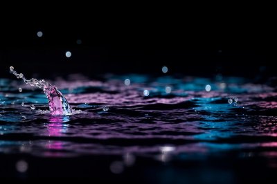 water, splash, liquid, drop, blue, pink, color, vibrant, motion, dynamic, ripple, surface, wave, abstract, texture, freshness, clean, cool, dark, art, design, flow, energy, nature, ai generated