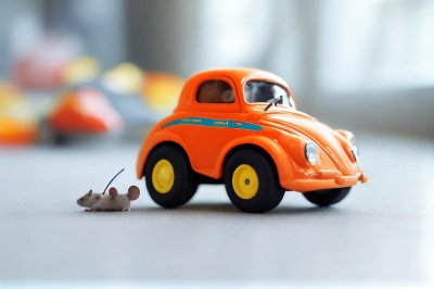 mouse, toy car, cute, playful, animal, small, sweet, imaginative, pet, orange, vehicle, miniature, rodent, pleasure, driver, childhood, trip, within, bright, nature, joy, ai generated
