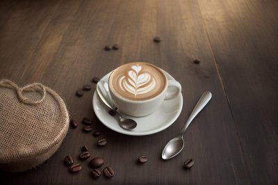 coffee, latte art, cup, heart, coffee beans, burlap surface, casual, hot drink, hot coffee, white and brown, fabric, coffee cup, acorns, rustic photography, cozy, coffee shop, woody ambiance, relaxed ambiance, barista