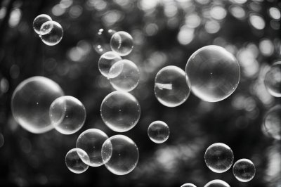 bubbles, background blur, black and white photography, artistic photography, transparency, contrast, optical effects, lightness, fantasy, ephemeral, magical, abstract, play of light and shadow, long exposure, refreshing, freedom, floating water, iridescence, natural feel, symphony of textures
