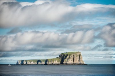 sea, island, cliffs, sky, clouds, shapes, blue, landscape, silhouette, calm, sunset, sediments, water, light, nature, tourism, reflection, lights, summer, horizon